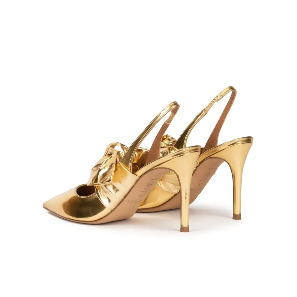 Jaqueline Zapatos altos destalonados en piel dorada con detalle de lazo